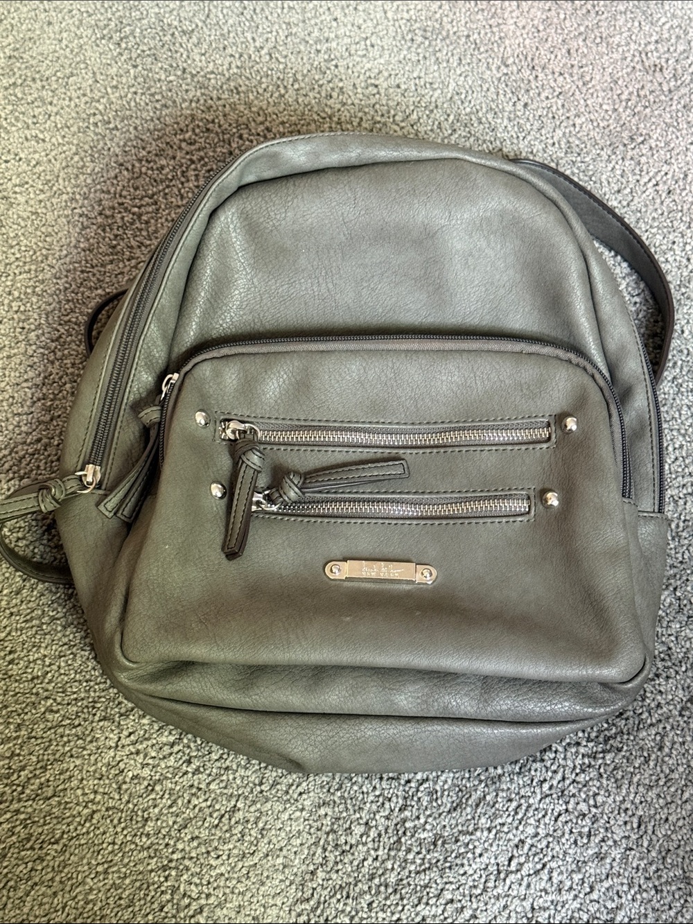 Nicole Miller Gray Faux Leather Backpack Bag. Adjustable Straps. 12”x12”x4”.